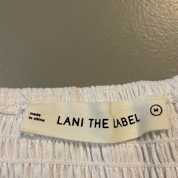 Lani the Label white button down long sleeve dress with ruffle on bottom - Picture 4 of 5